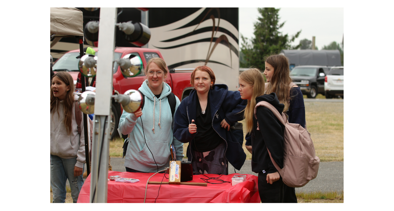 Teacher and students trying out the practice tree.